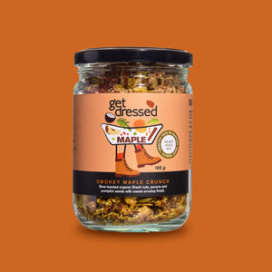 Smokey Maple Crunch ingredients scattered — pecans,
Brazil nuts, hemp seeds